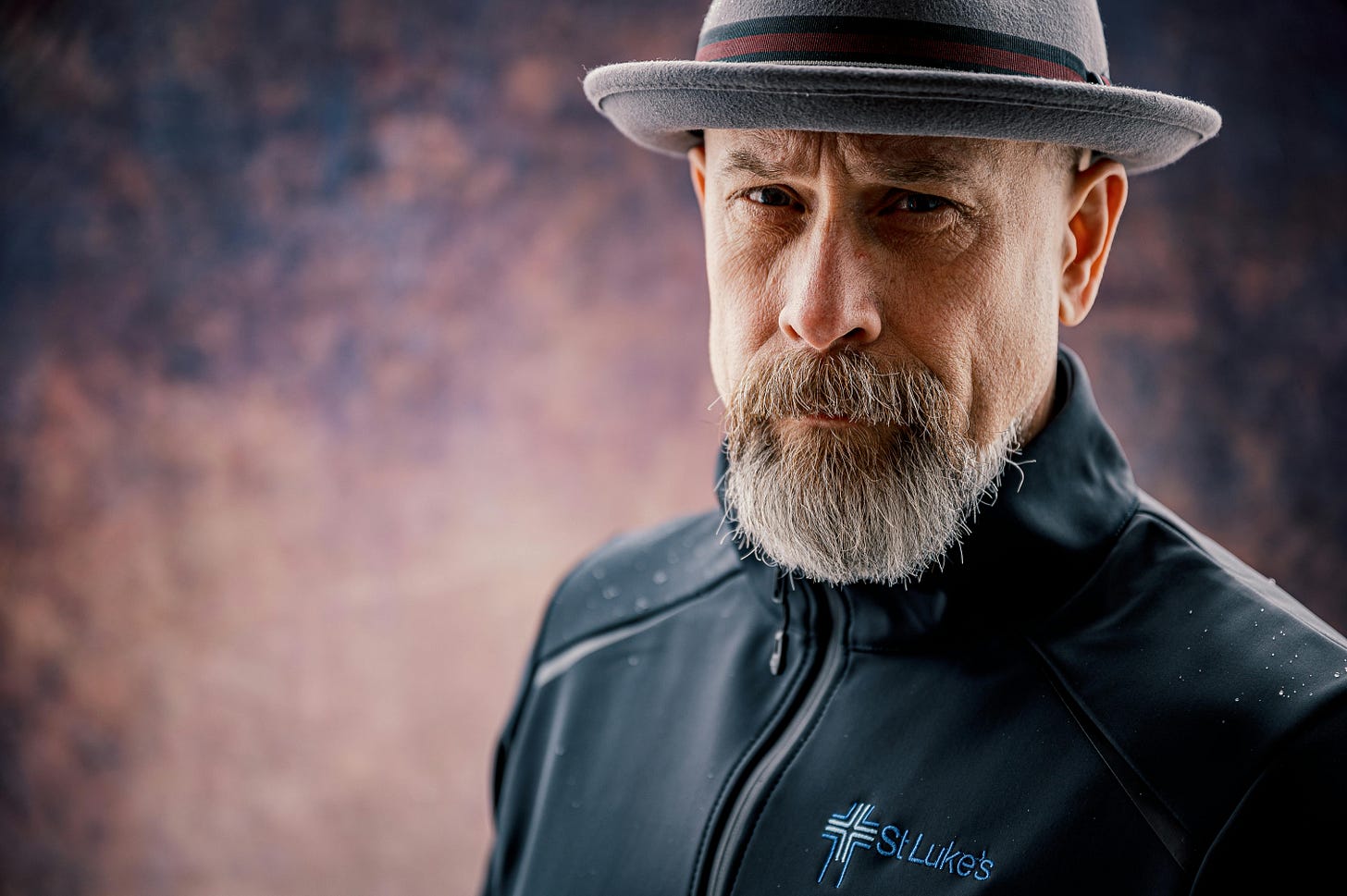 man in midlife looking determined