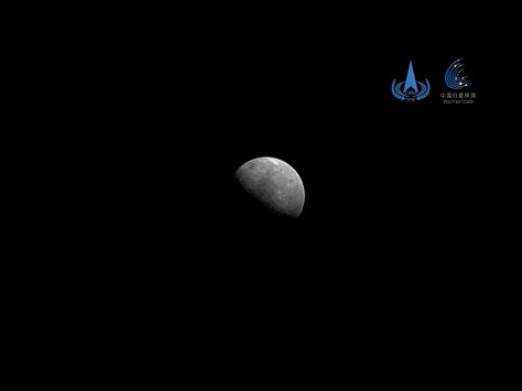 Images taken by Tianwen-2's camera's from earlier in the mission, capturing one of its solar panels, Earth, and the Moon.