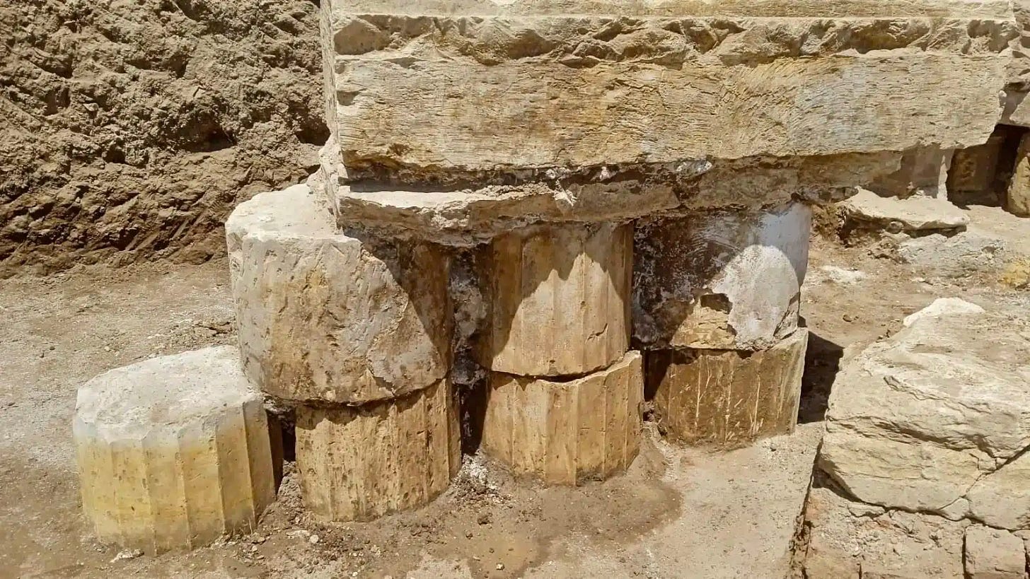 Reused stone blocks and architectural remains show how builders later incorporated earlier temple elements into the basilica structure. Reused stone blocks and architectural remains show how builders later incorporated earlier temple elements into the basilica structure.
