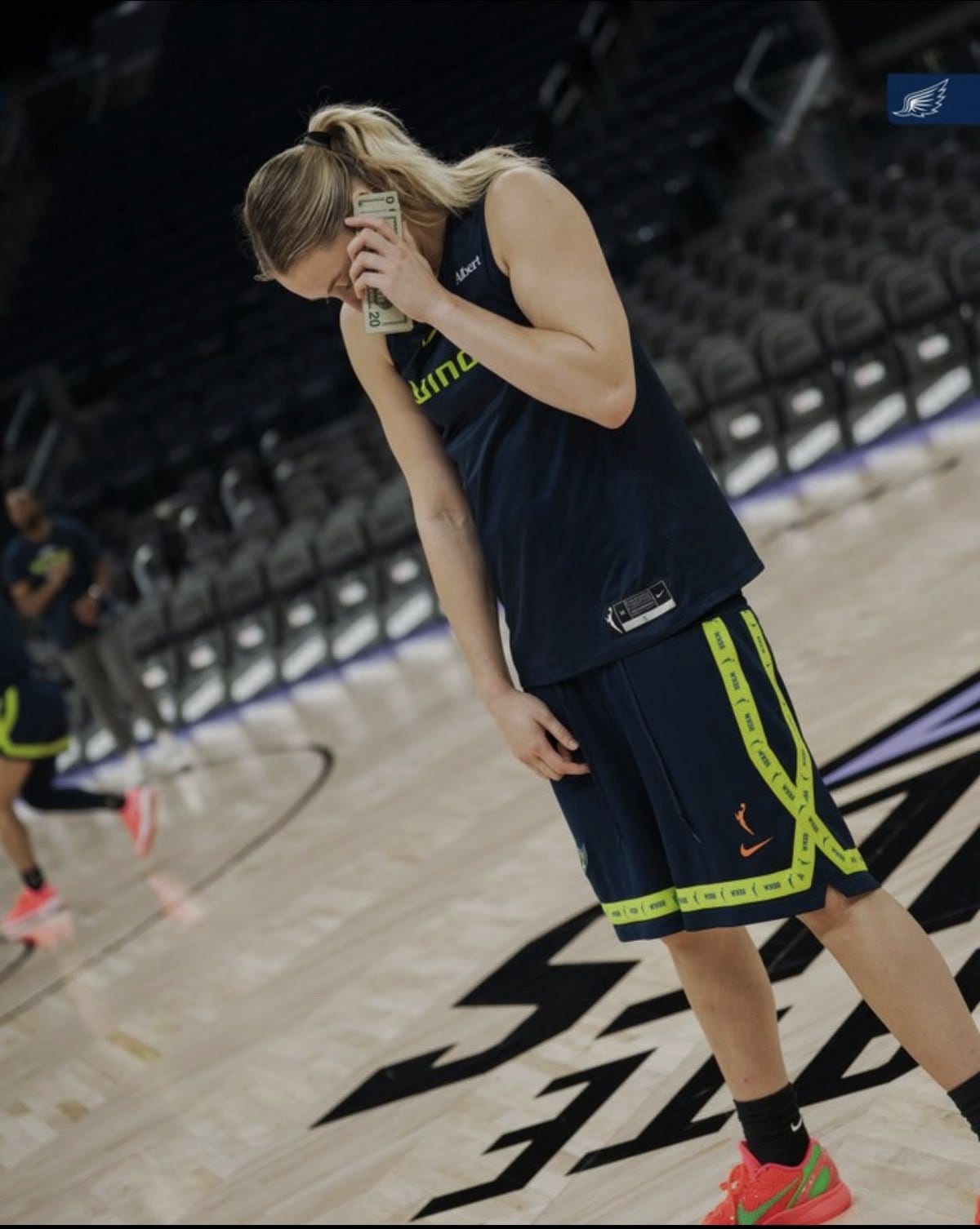 WNBA player on the court during warmups WNBA player on the court during warmups
