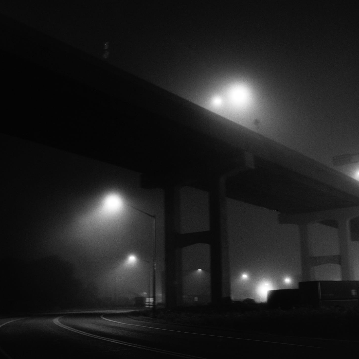 Bridge and road in the fog