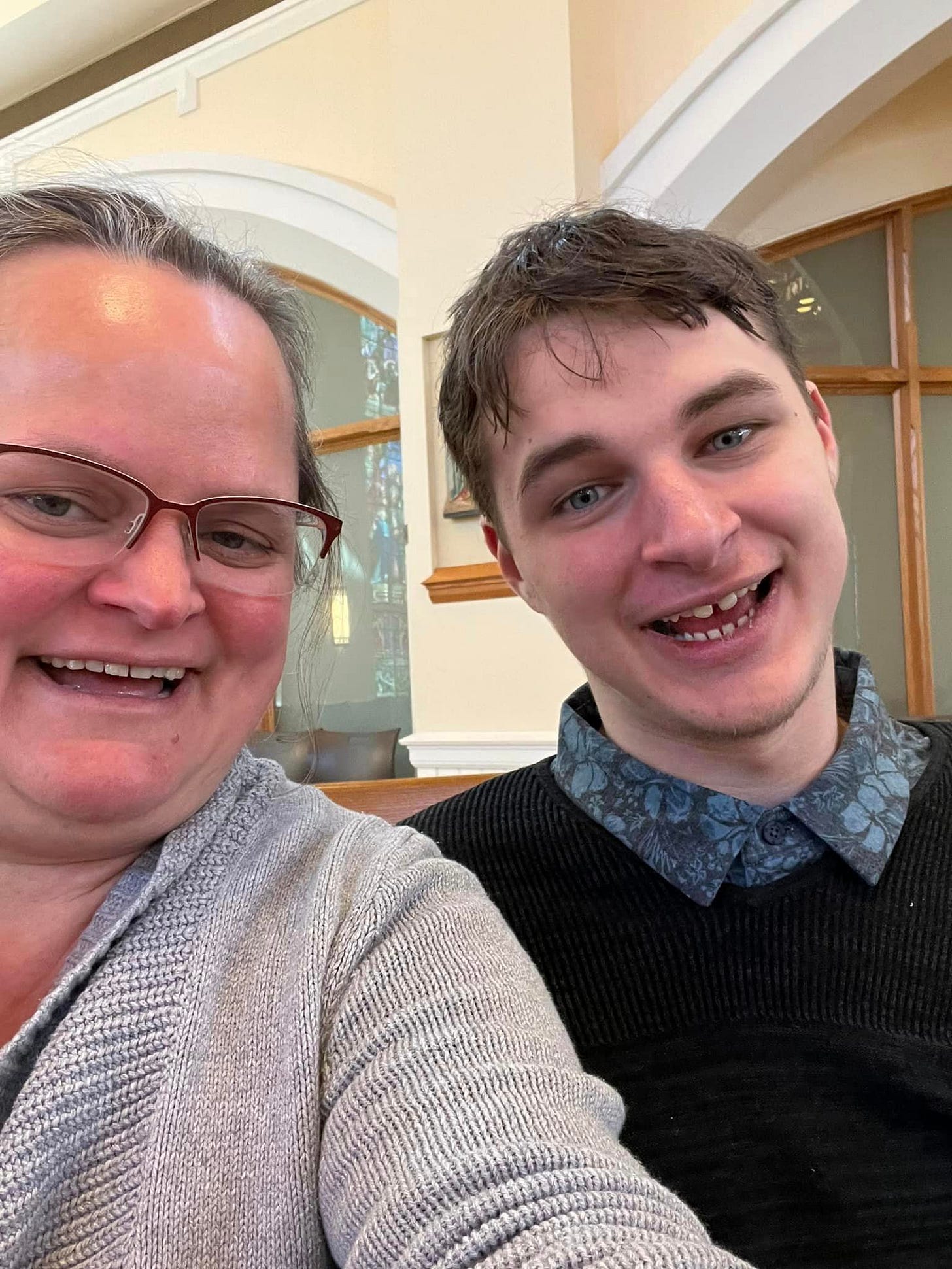 May be an image of 2 people and people smiling