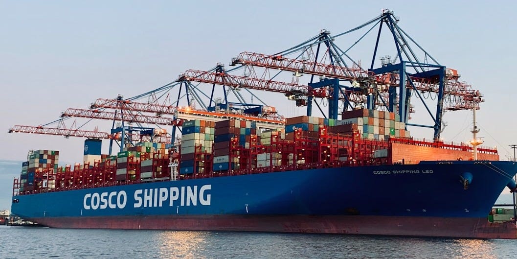 cargo ship on dock during daytime cargo ship on dock during daytime