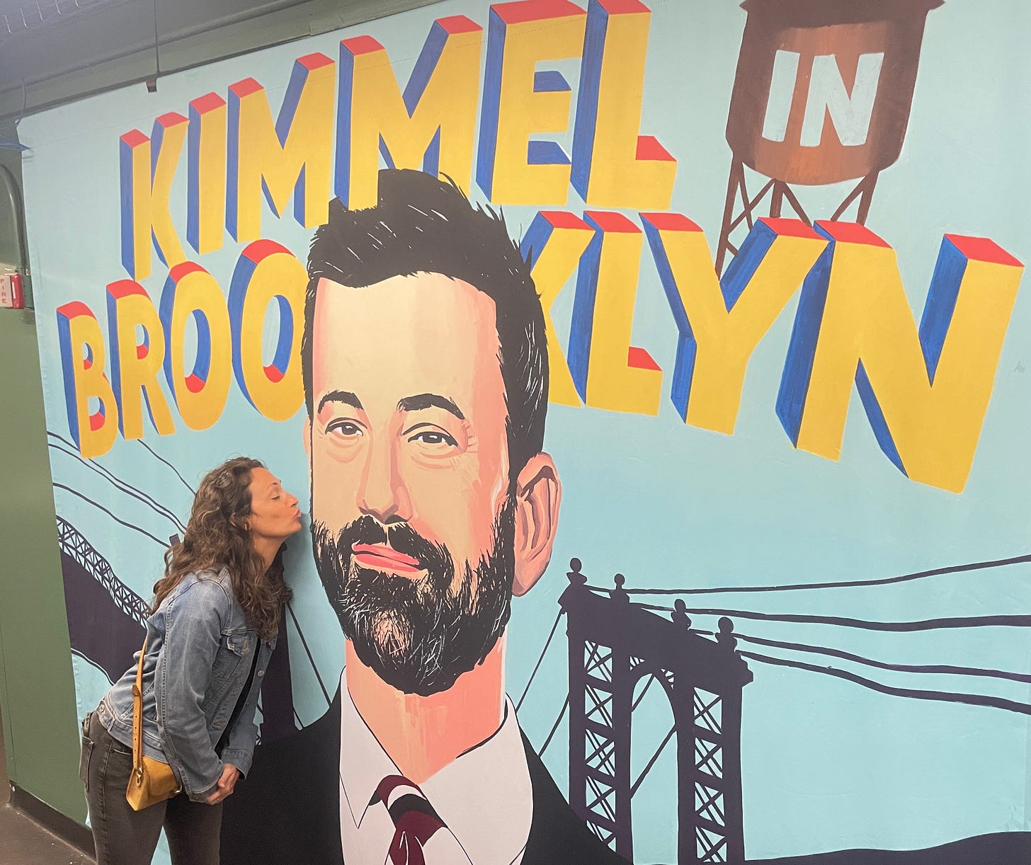 My wife kissing Jimmy Kimmel.