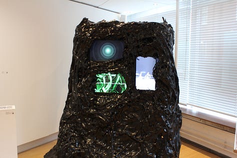 A selection pof artwoerks with various screens prints and 3d plastic peripherals. 