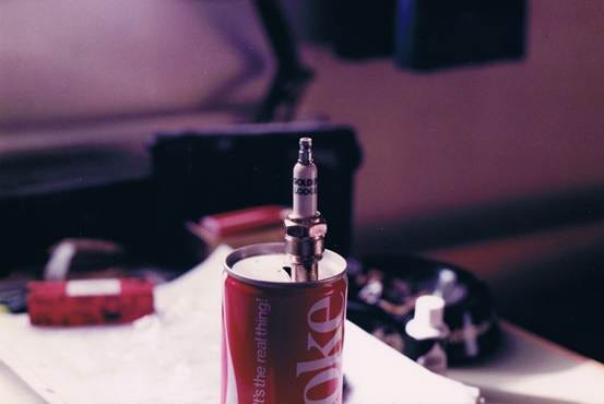 A can with a spark plug
AI-generated content may be incorrect. A can with a spark plug
AI-generated content may be incorrect.