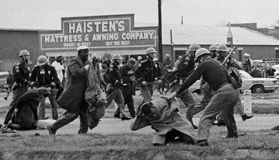 man being beaten by police during march in selma, alabama man being beaten by police during march in selma, alabama