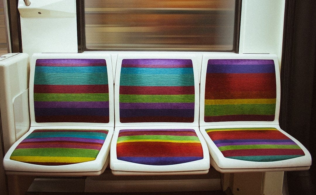 white and purple plastic chairs