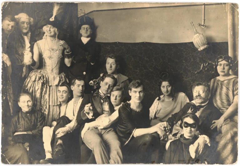 Costume party at the Institute for Sexual Research in Berlin, date and photographer unknown. Magnus Hirschfeld (in glasses) holds hands with his partner, Karl Giese (centre). Credit: Magnus-Hirschfeld-Gesellschaft e.V., Berlin