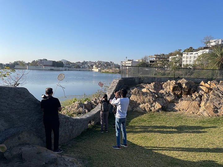 People sketching and bird watching at Udaan Park, Udaipur, Rajasthan.