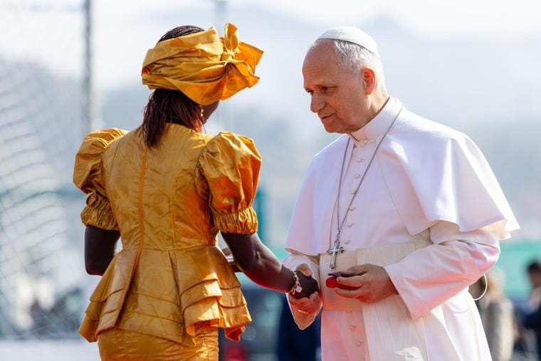 Pope Leo XIV greets Bousso Diouf, a woman from Senegal, at t Pope Leo XIV greets Bousso Diouf, a woman from Senegal, at t