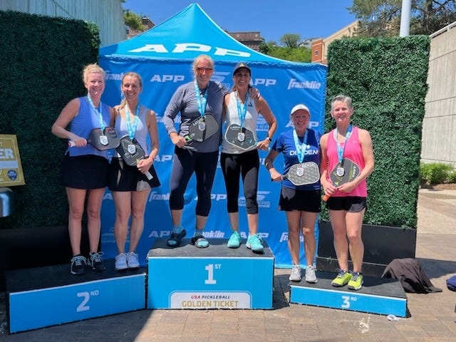Cristen with pickleball medals, and on the winner's podium in pickleball