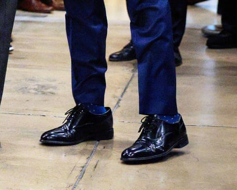 Marco Rubio wearing shoes gifted to him by Donald Trump.