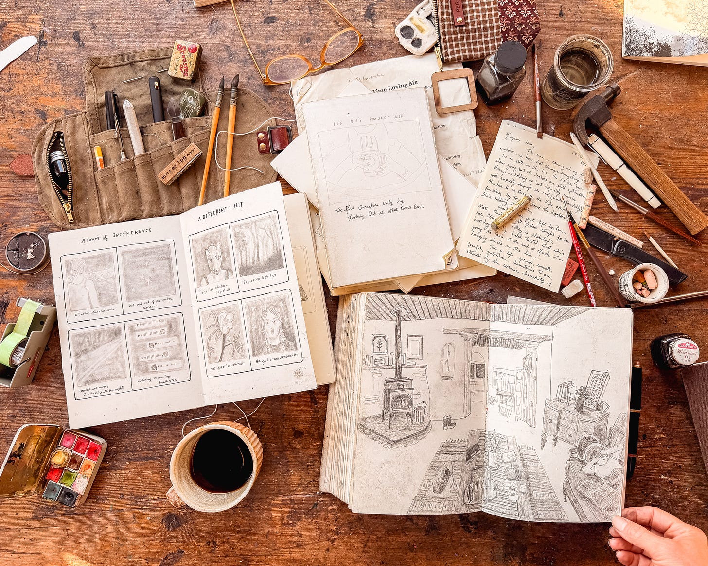 Journals and messy desk Peg and Awl artist roll