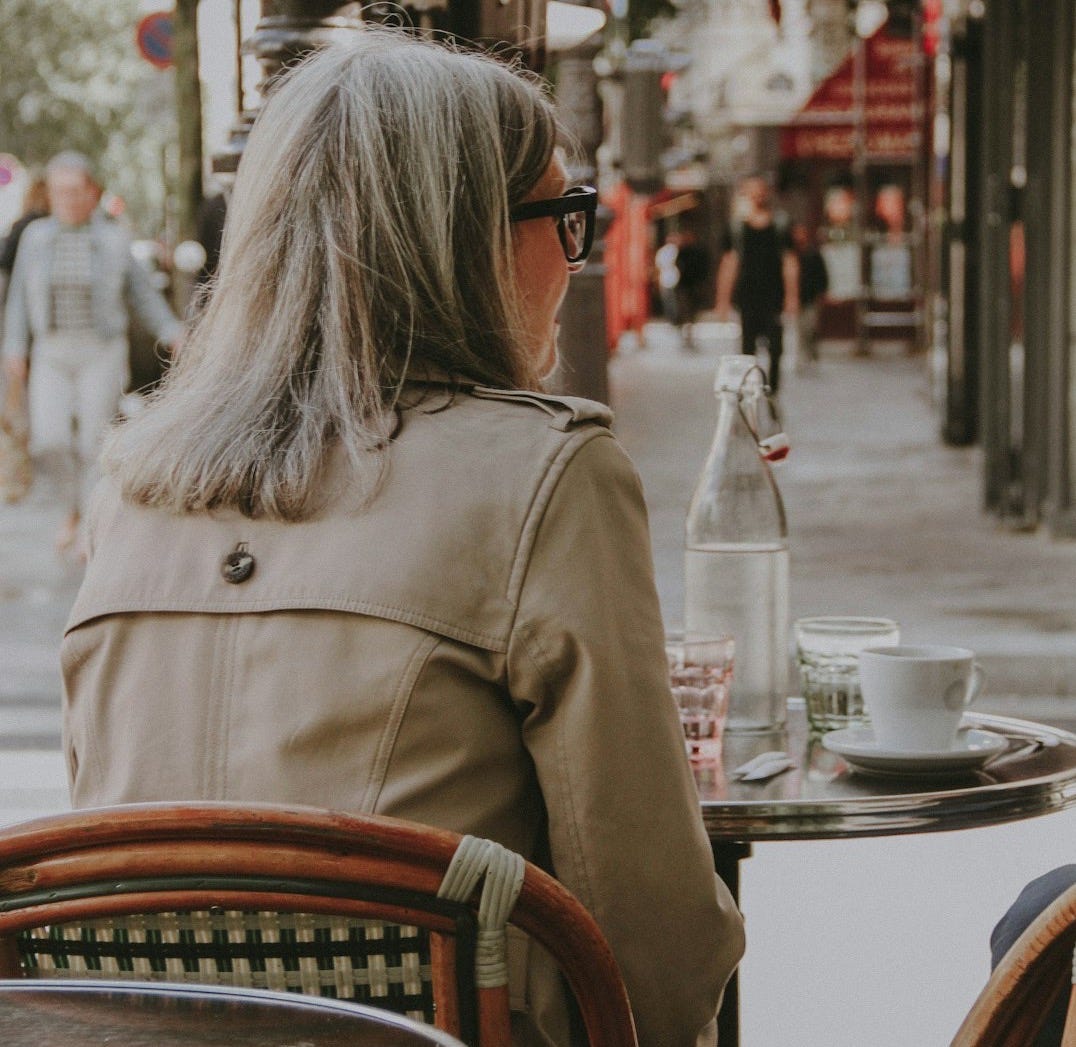 woman sitting at the table