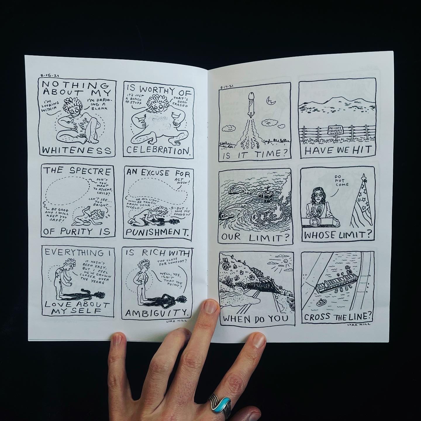 The new zine is open to a page showing two comics.