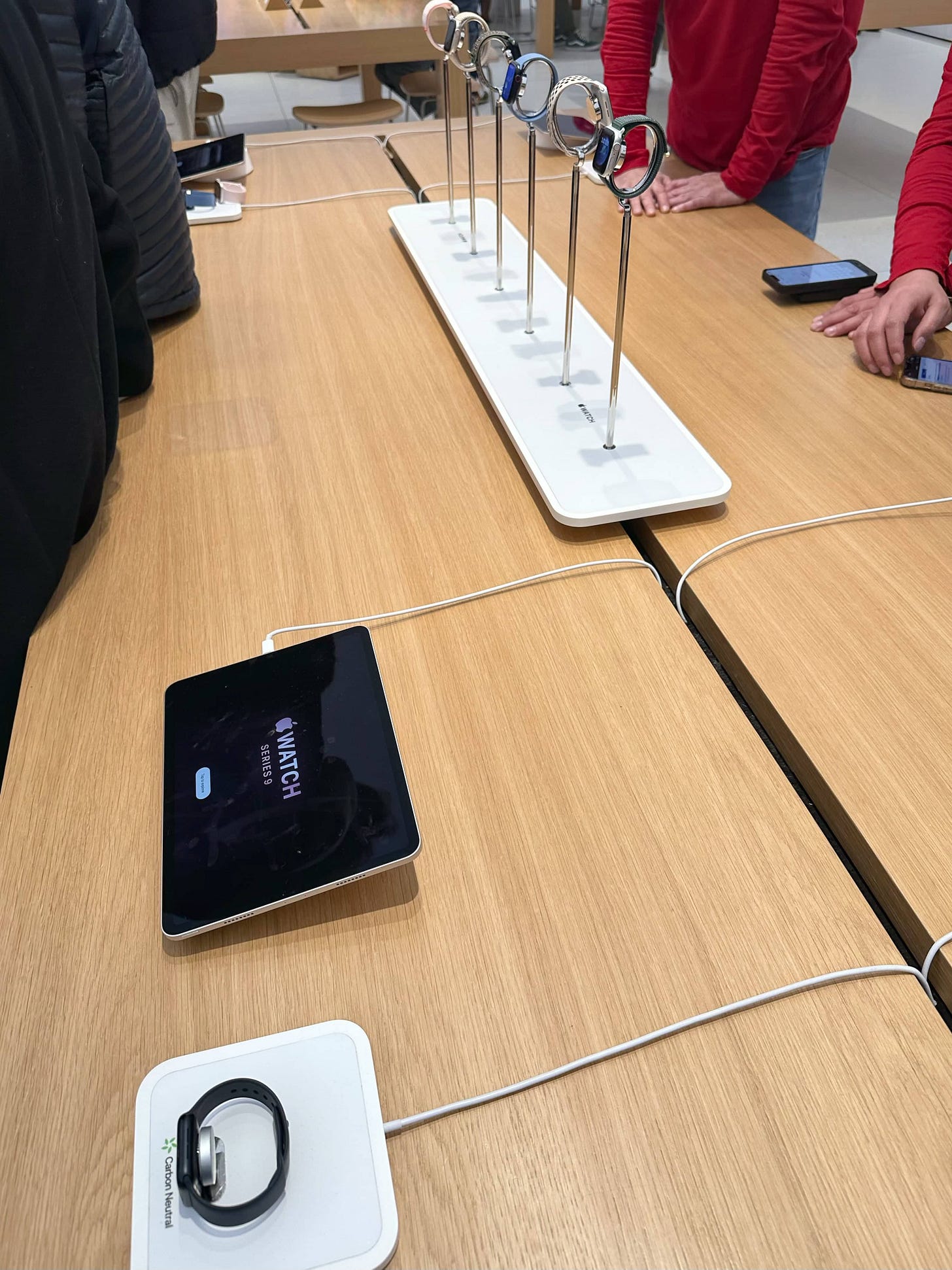 Temporary Apple Watch merchandising including a riser and demo iPads. Temporary Apple Watch merchandising including a riser and demo iPads.