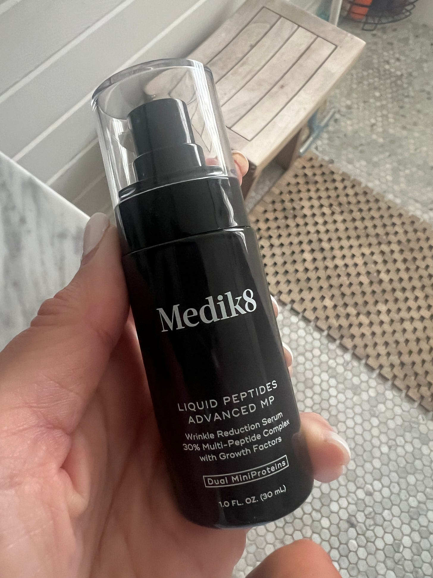 A bottle of Medik8 Liquid Peptides Advanced MP serum, a 30% multi-peptide complex featuring Dual MiniProteins technology. A bottle of Medik8 Liquid Peptides Advanced MP serum, a 30% multi-peptide complex featuring Dual MiniProteins technology.