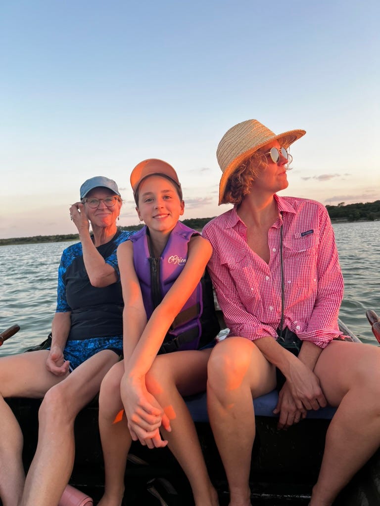 A group of people sitting on a boat

AI-generated content may be incorrect.