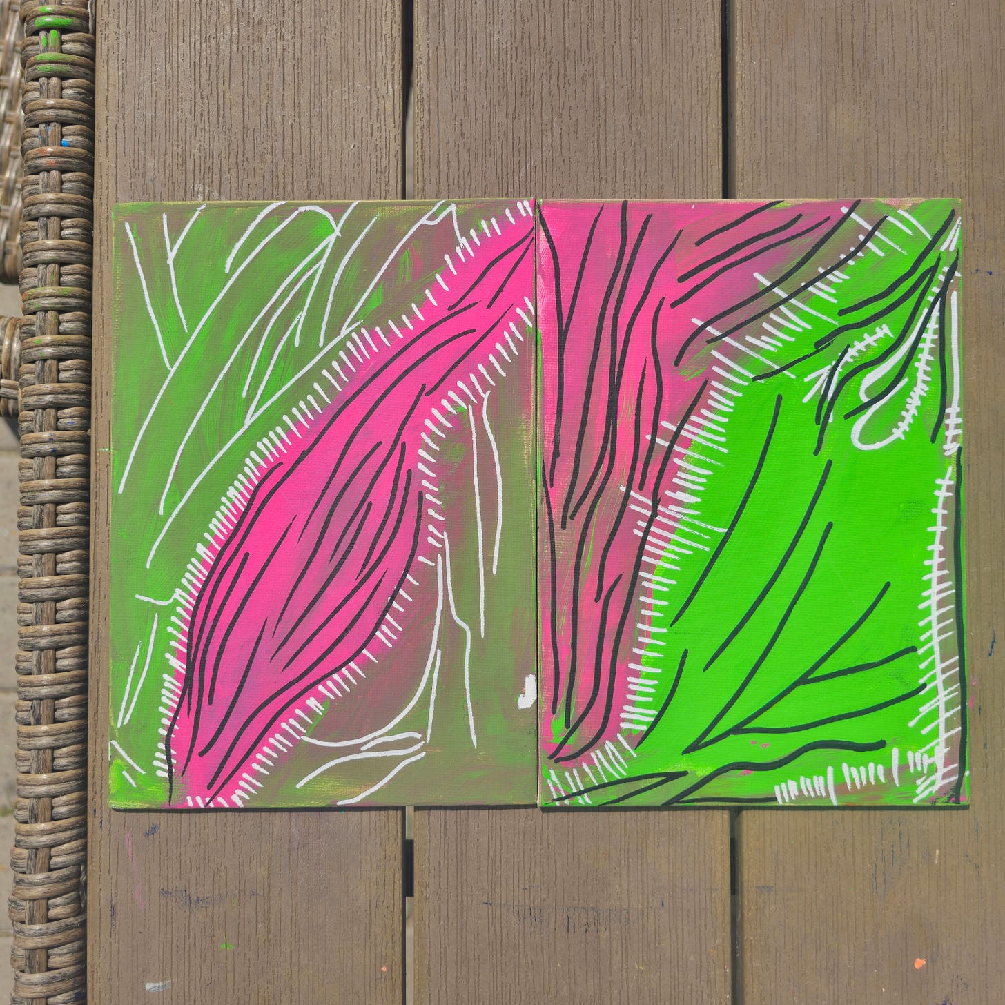 A mixed media diptych on canvas panels featuring a clash of neon green and hot pink acrylic backgrounds. Thick, organic black marker lines flow vertically across both panels, intersected by white, stitch-like acrylic hatch marks. The composition connects the two rigid panels through energetic, biological line work.