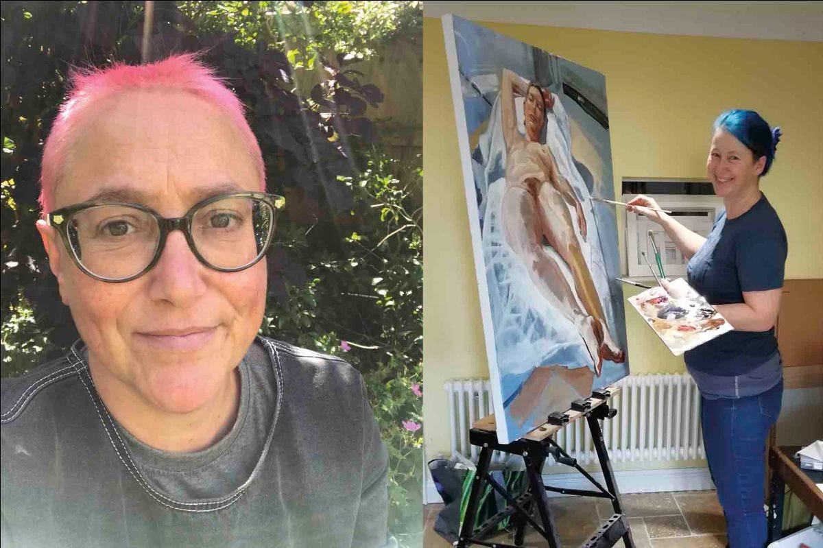 Pink haired artist with glasses, and blue haired artist at an easel