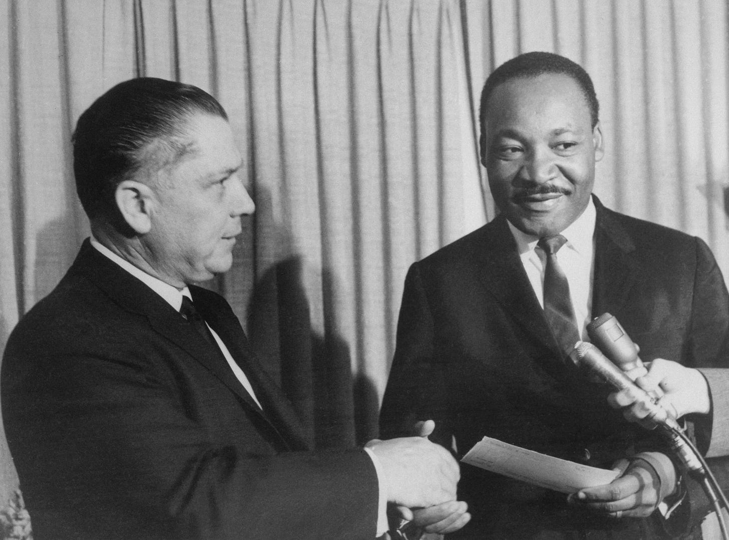 An iconic meeting between Teamsters president Jimmy Hoffa and civil rights leader Martin Luther King Jr. in the 1960s.