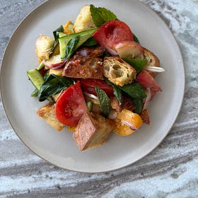 tomato and peach panzanella with fresh garlic chili crisp