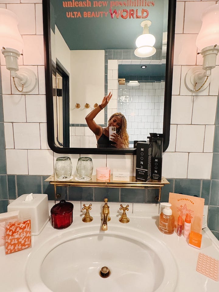 Amber Venerable explores the booths at Ulta Beauty World