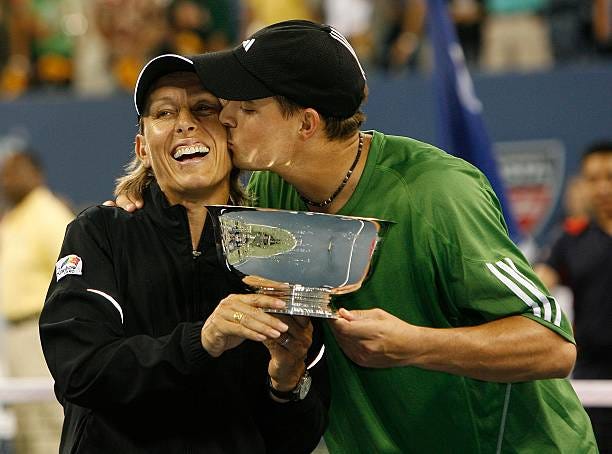 September 9: Martina Navratilova and Bob Bryan of the United States celebrate with the trophy after their victory in the mixed doubles final against...