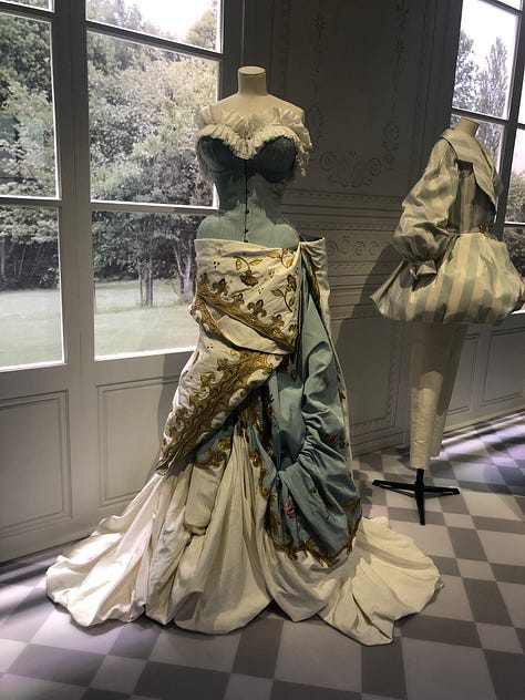 A gallery showing Dior dresses through the decades, taken at the V&A Museum for the Dior - Designer of Dreams Exhibition back in 2019.