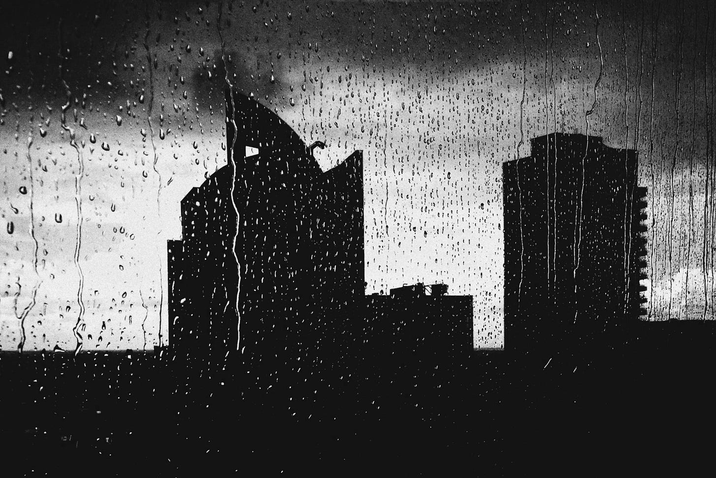 silhouette of high rise buildings silhouette of high rise buildings