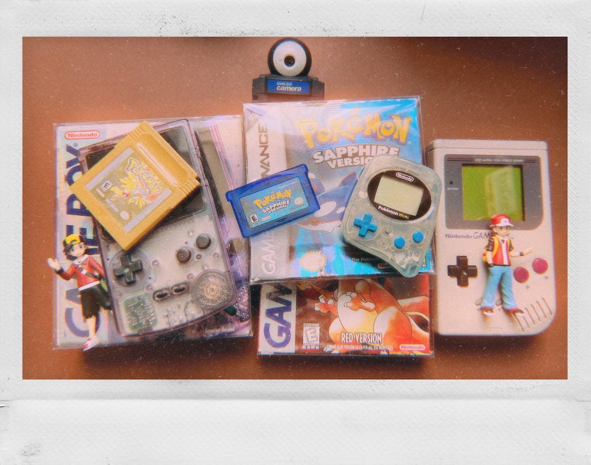 Some of BlueArticuno’s beloved items, including his Game Boys, Pokémon games, and some cool figures of Red and Ethan Some of BlueArticuno’s beloved items, including his Game Boys, Pokémon games, and some cool figures of Red and Ethan