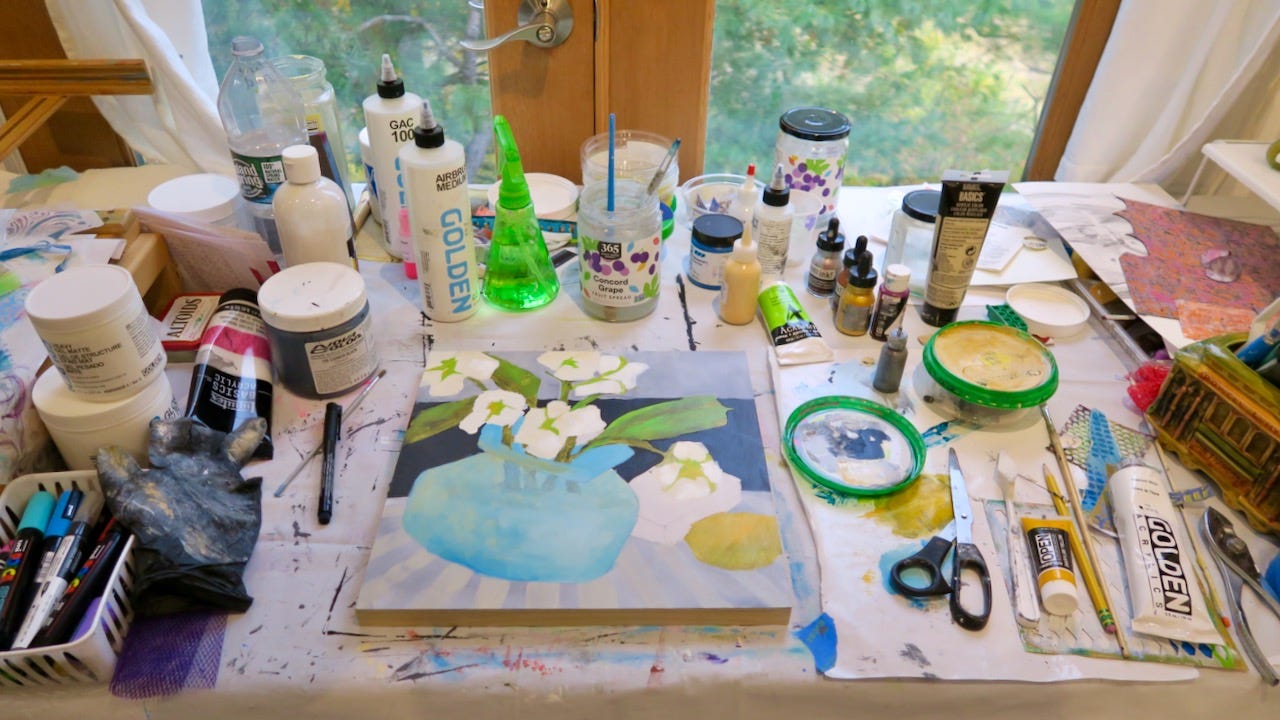 A picture containing indoor, cluttered, office, messy

Description automatically generated