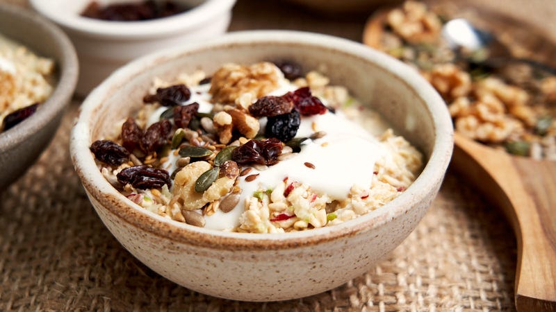 Bircher Muesli - bowl of Swiss oatmeal ready for breakfast with toppings and yogurt | The Worktop
