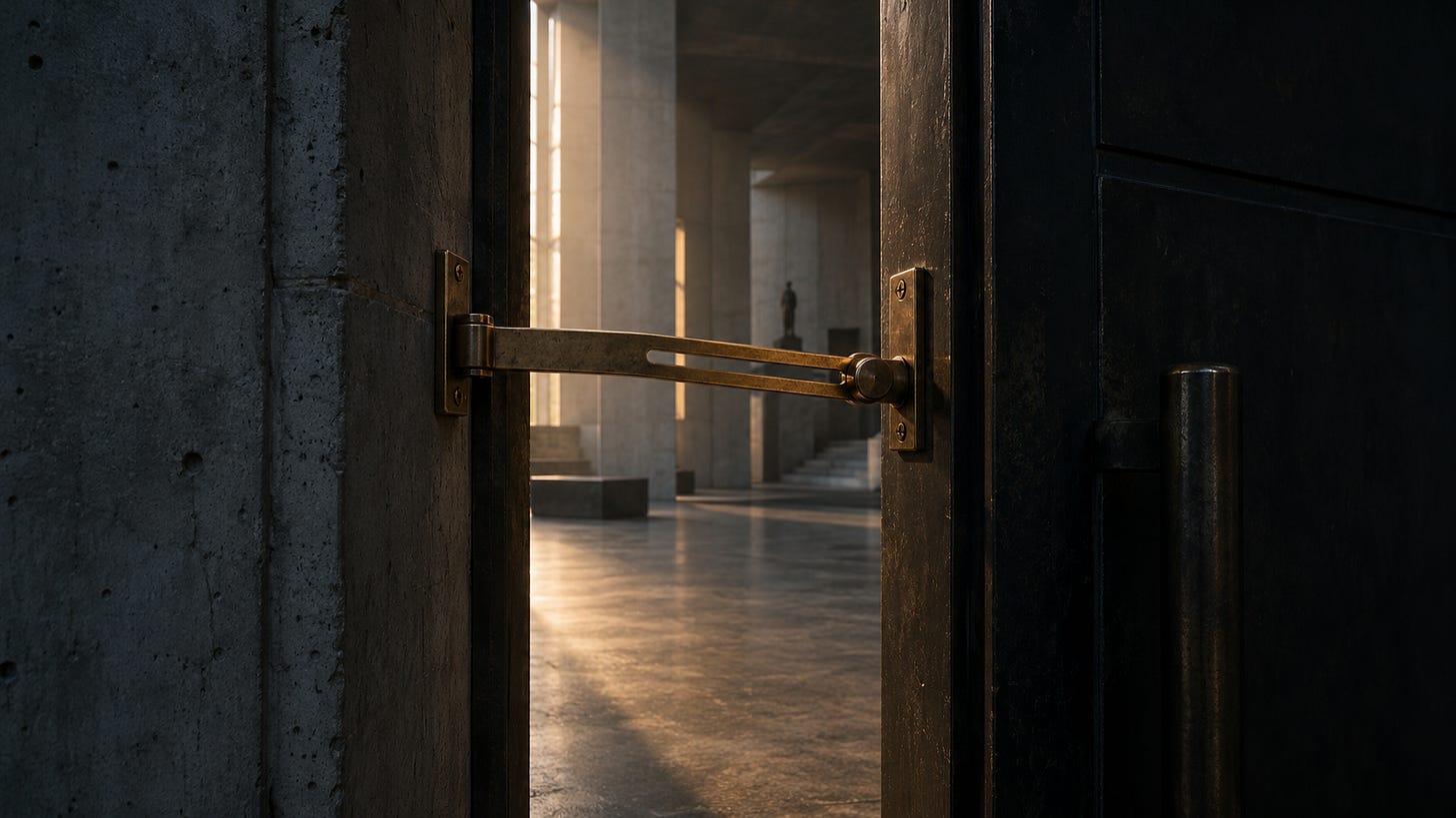 A brass door stay limits the opening of a heavy door. A brass door stay limits the opening of a heavy door.
