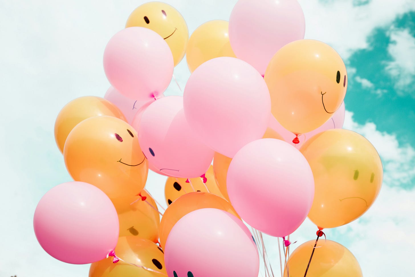 Happy balloons from Madison Oren, Unsplash