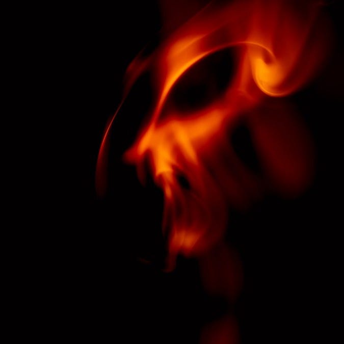womans face in dark room