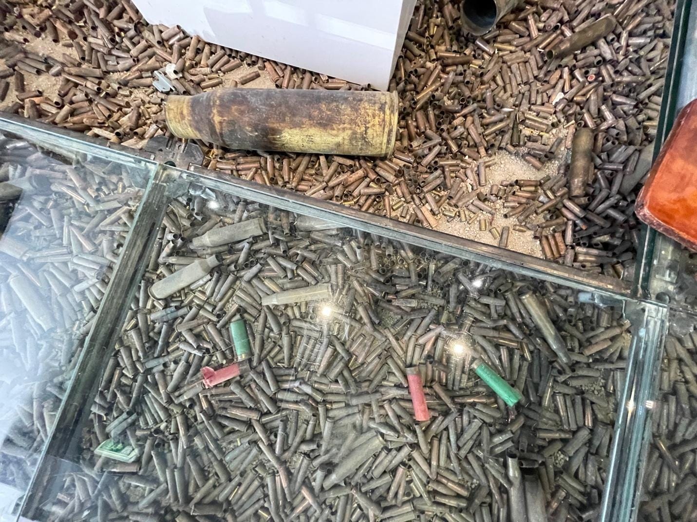 A pile of bullets on the floor
AI-generated content may be incorrect. A pile of bullets on the floor
AI-generated content may be incorrect.