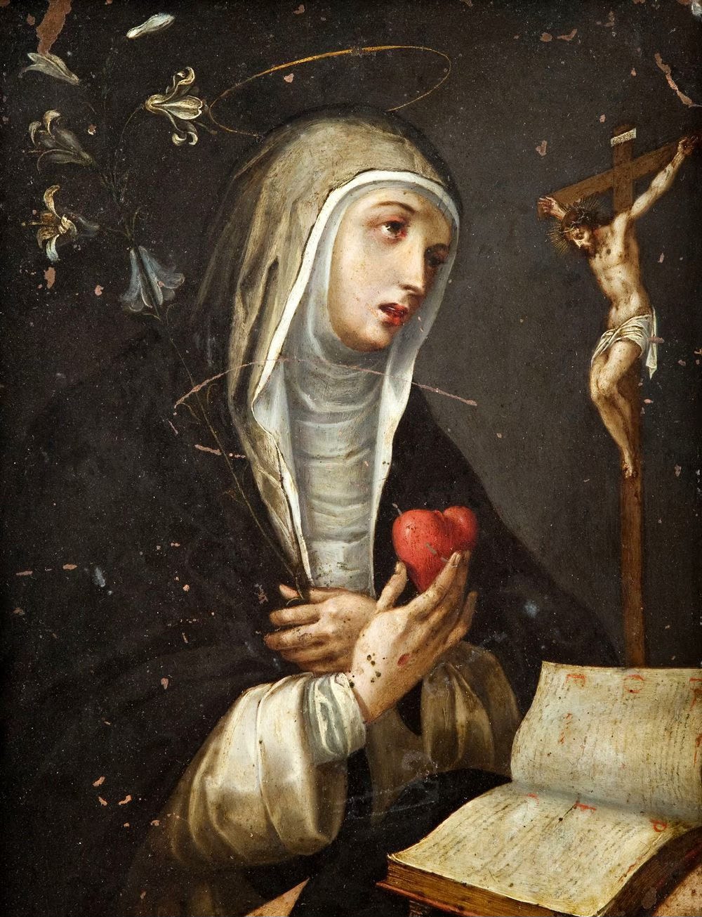 St. Catherine of Siena hold a heart gazing at Crucifix