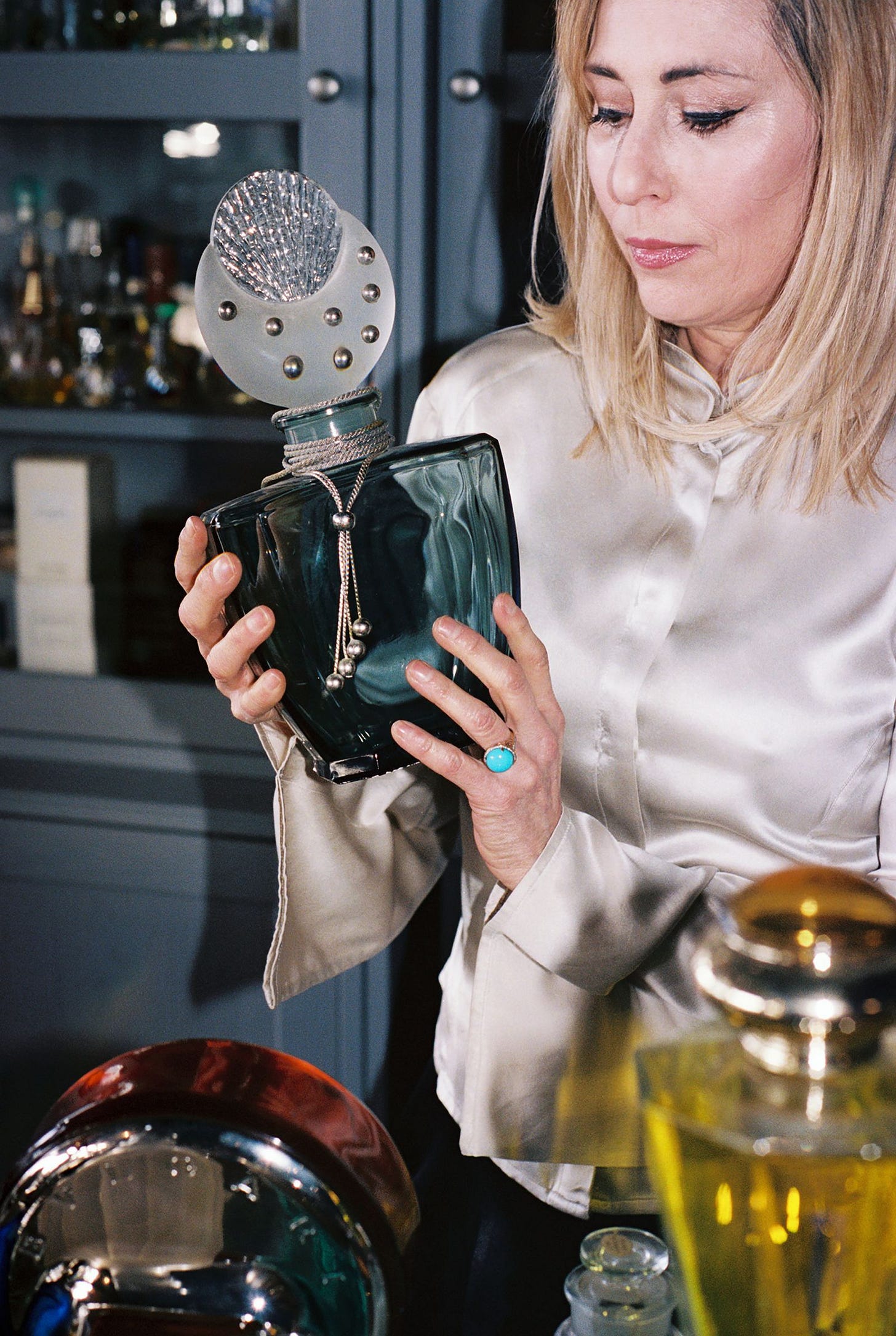 Image may contain Adult Person Bottle Cosmetics and Perfume