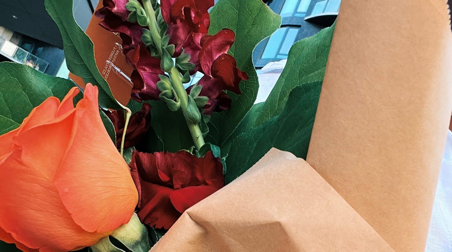 Bouquet of flowers wrapped in paper