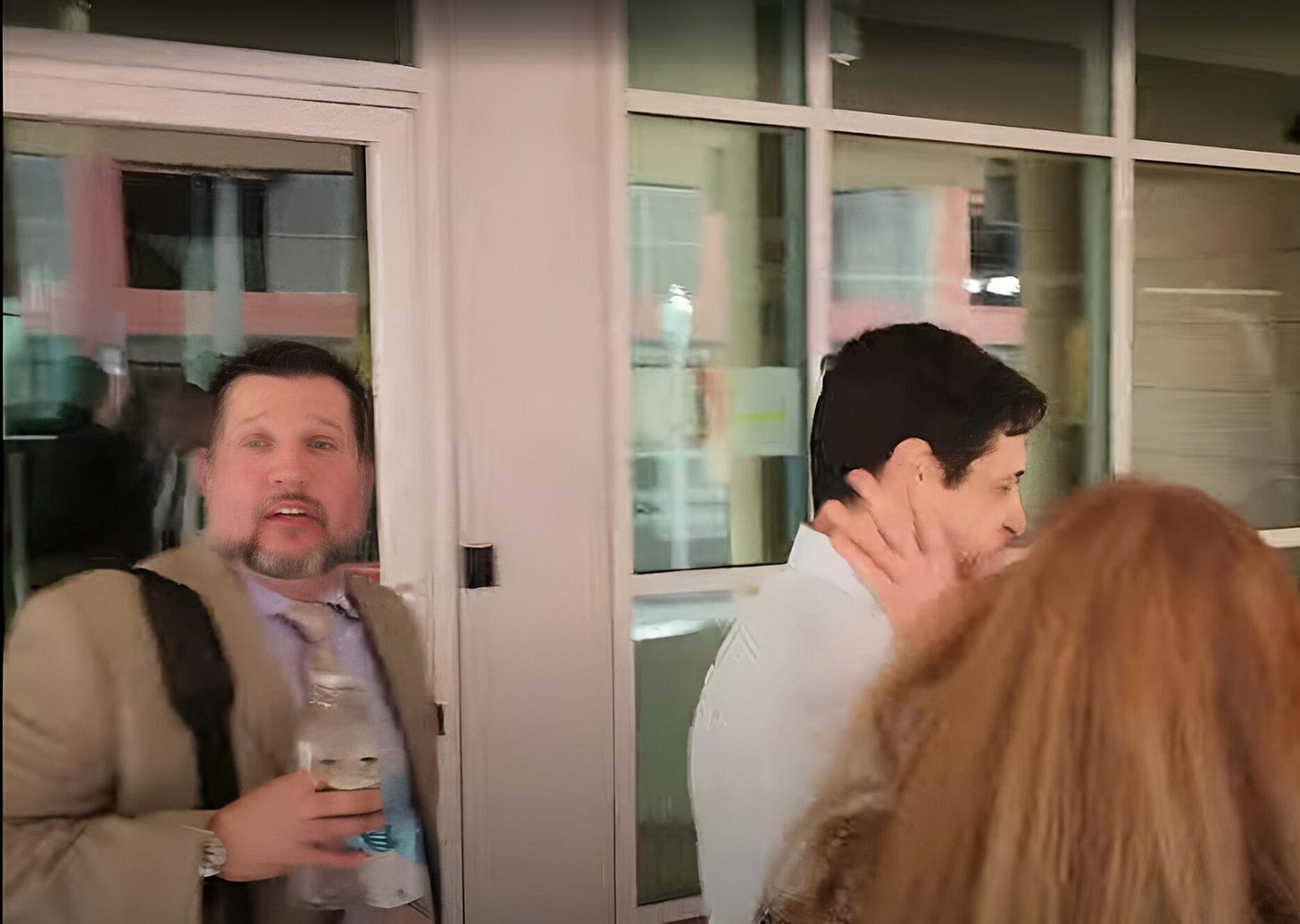 Chiappetta and Noshirvan avoid the cameras outside Fort Myers federal court.