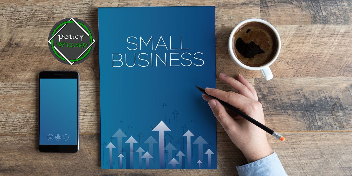 Small Business book with a phone and PolicyWizard Logo