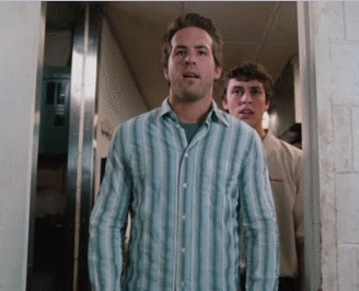 A gif of Ryan Reynolds shuddering from he film Waiting.