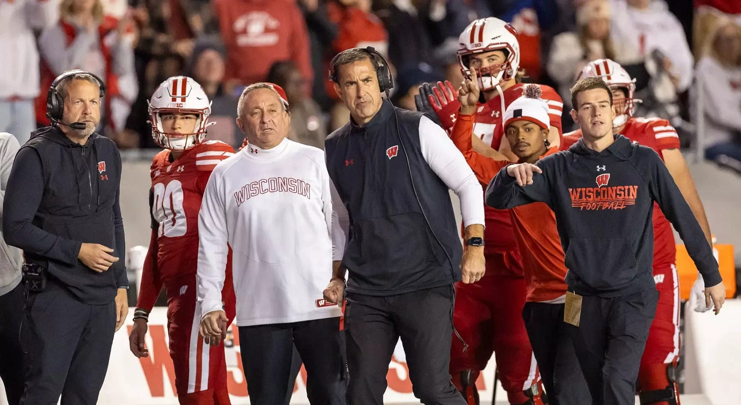 Wisconsin Badgers head coach Luke Fickell stands on the sideline with members of his coaching staff during a football game. Photo courtesy of UW Athletics. Wisconsin Badgers head coach Luke Fickell stands on the sideline with members of his coaching staff during a football game. Photo courtesy of UW Athletics.