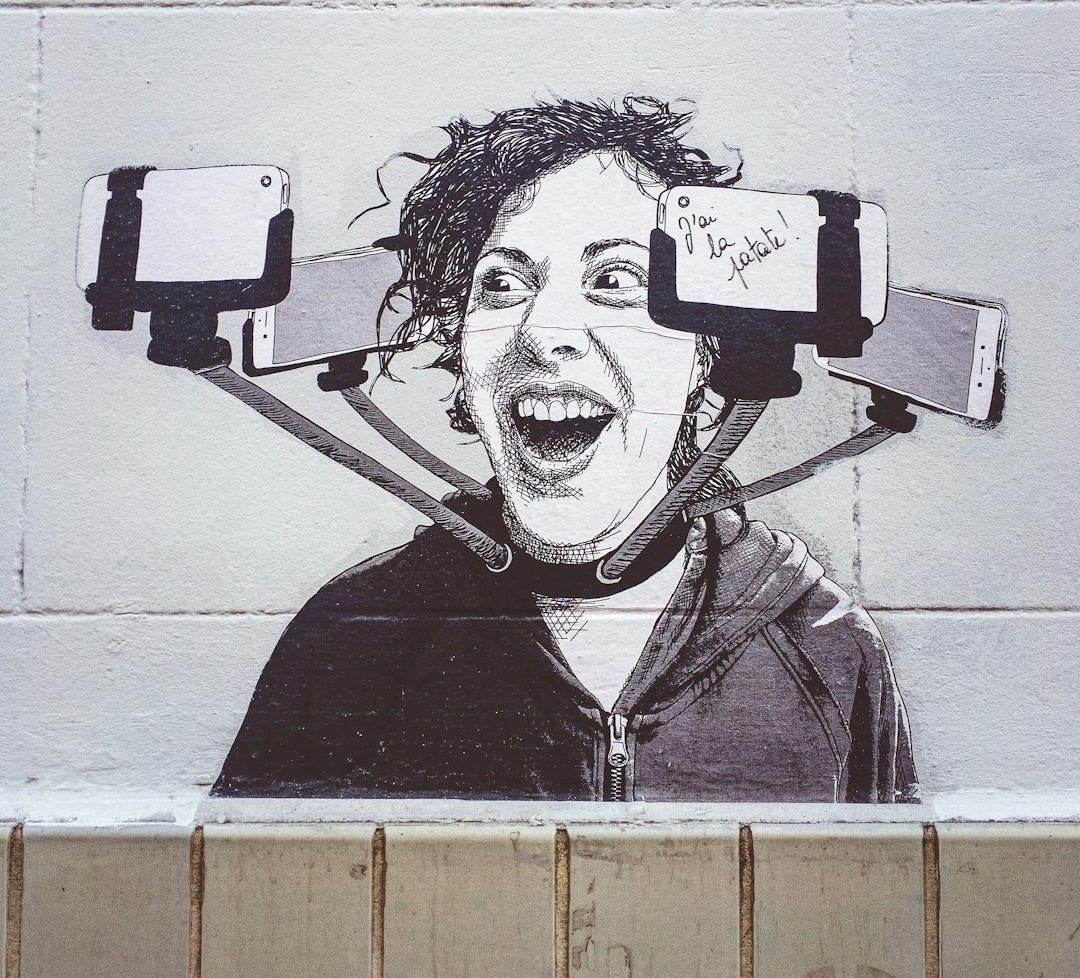 man in black leather jacket drawing