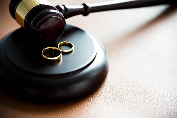 Illustration of divorce concept with two rings on gravel Gavel and wedding rings, for divorce concept. divorce court stock pictures, royalty-free photos & images