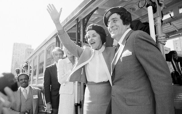 San Francisco Mayor Dianne Feinstein and singer Tony Bennett, who sang "I Left My Heart in San Francisco," hang onto the outside of a cable car in San Francisco before taking a test ride, May 2, 1984. (AP Photo/Jeff Reinking, File) San Francisco Mayor Dianne Feinstein and singer Tony Bennett, who sang "I Left My Heart in San Francisco," hang onto the outside of a cable car in San Francisco before taking a test ride, May 2, 1984. (AP Photo/Jeff Reinking, File)