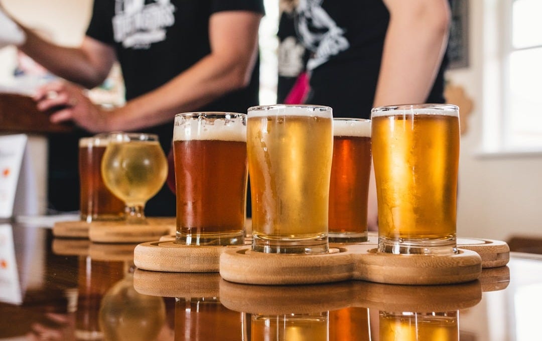 clear drinking glass with beer