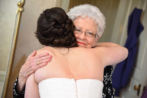 Three pictures of my grandmother at my wedding. The first is a dark haired white woman in a wedding dress hugging a white haired white woman in a pantsuit. The second is the woman in the wedding dress and a man in a suit posing with the white haired woman in a pantsuit. The third is a fabulous white haired woman posing for a photobooth picture.